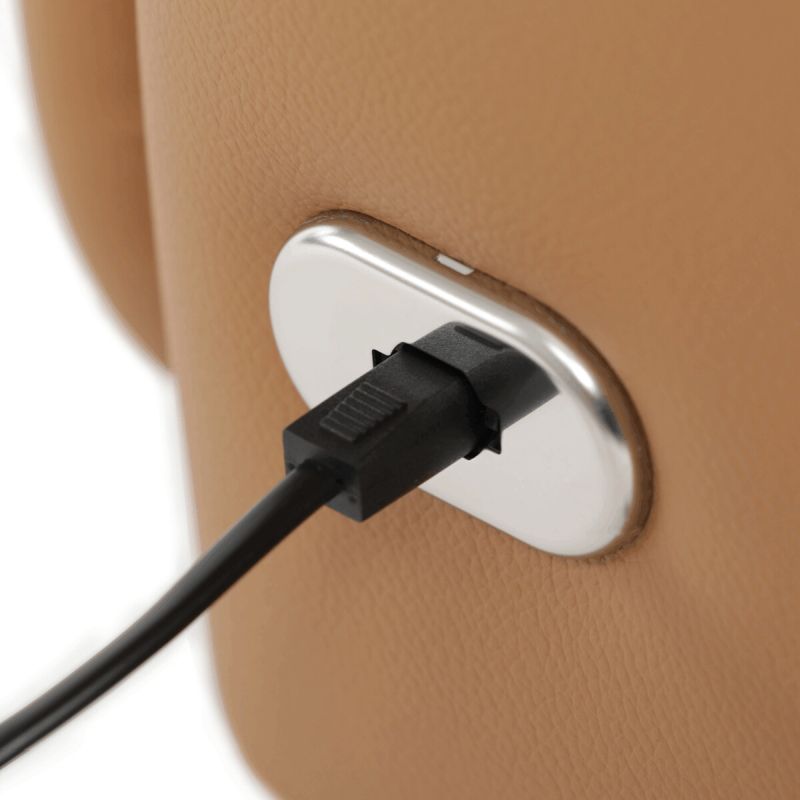 Luxusné béžové kožené relaxačné kreslo s elektrickým polohovaním