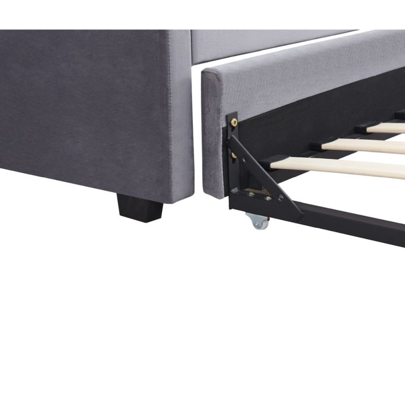 Rozkladacia posteľ s prístelkou, čalúnená látkou v sivom prevedení