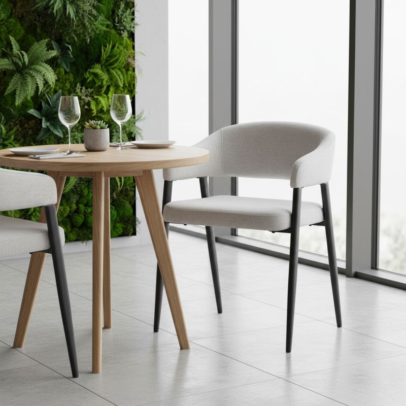 Dizajnové jedálenské kreslo svetlosivá látka s čiernymi kovovými nohami