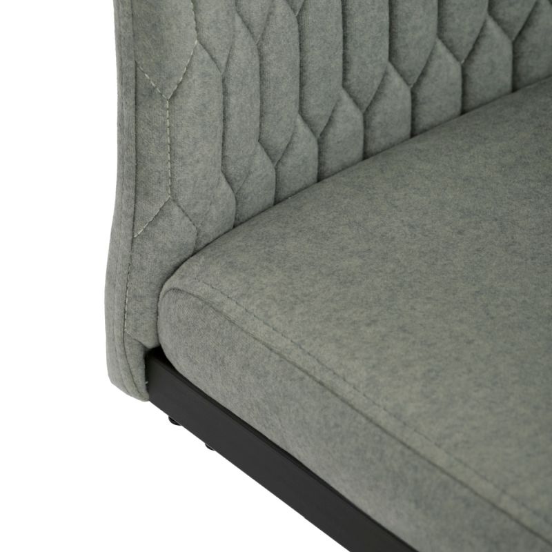 Čalúnená jedálenská stolička, zelená látka, čierna pohupovacia podnož