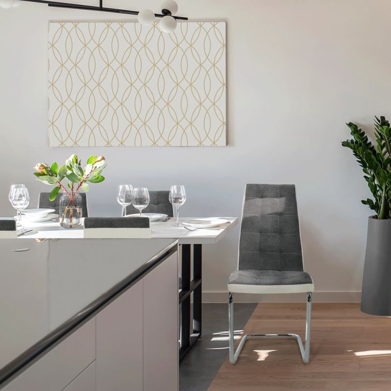 Štýlová a moderná jedálenská stolička v tmavosivej látke s ekokožou