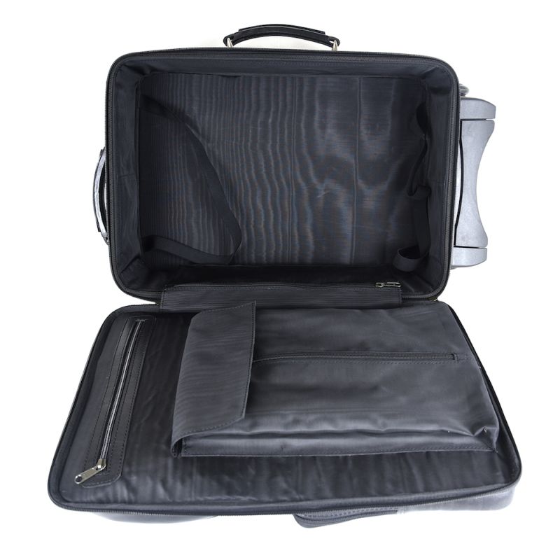 Celokožený cestovný kufor s mechanikou v čiernej farbe, tmavé kovanie